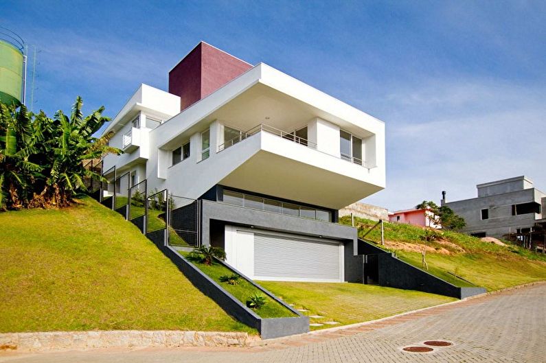 Conceptions de maisons modernes dans un style high-tech - Maison de luxe sur la pente