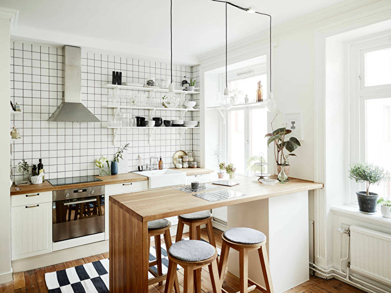 Cuisine de style scandinave blanc avec bar petit-déjeuner - design d'intérieur